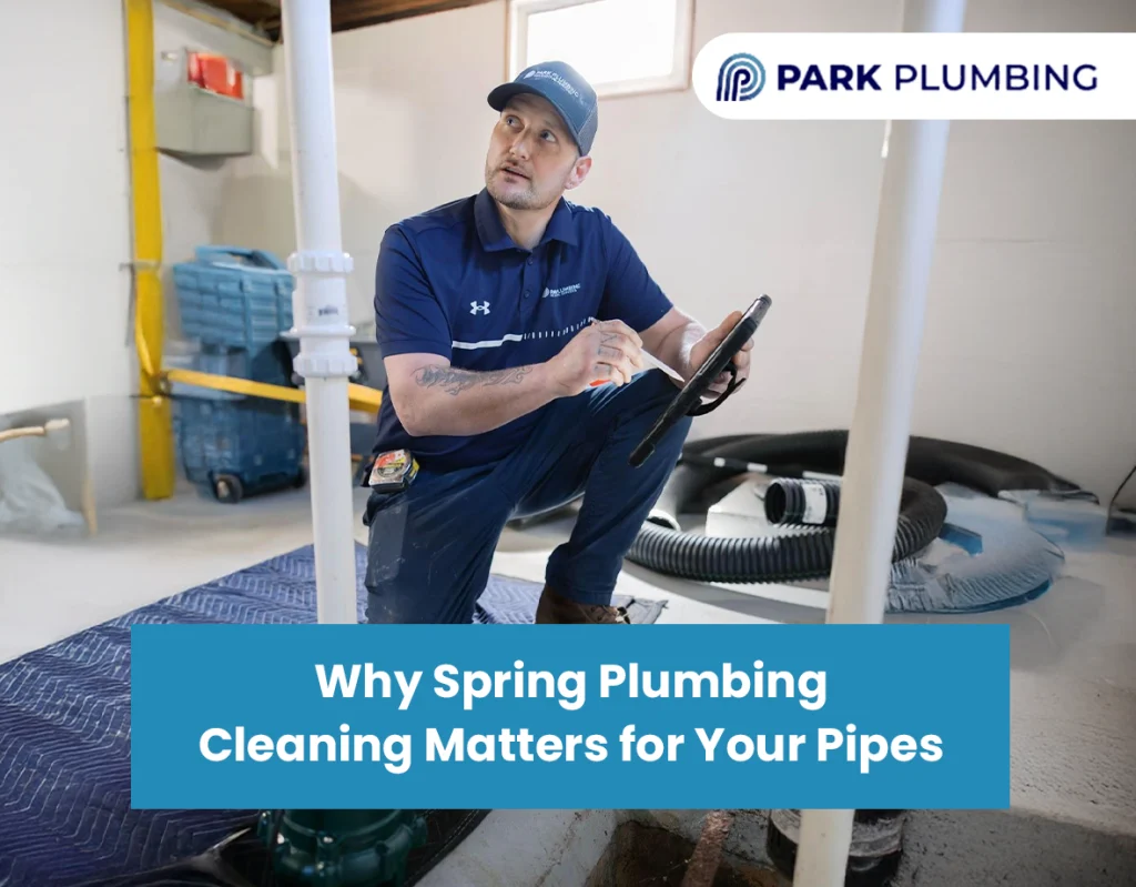 Plumber inspecting pipes during spring plumbing cleaning in a home 