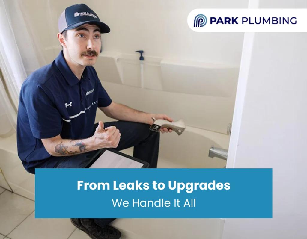 Professional plumber providing commercial plumbing repair services inside a business facility.