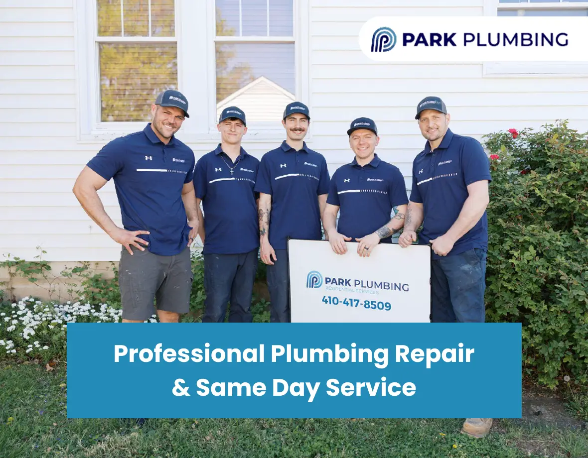 Professional plumber fixing pipes in a home, using tools to perform plumbing repair services.